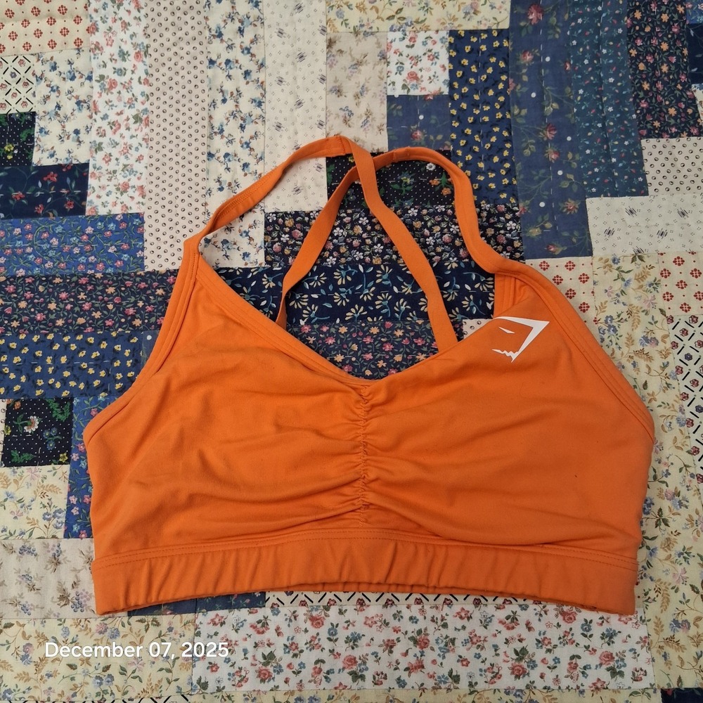 Gymshark Ruched Sports Bra Size XS Orange Strappy Cross Back Wireless
